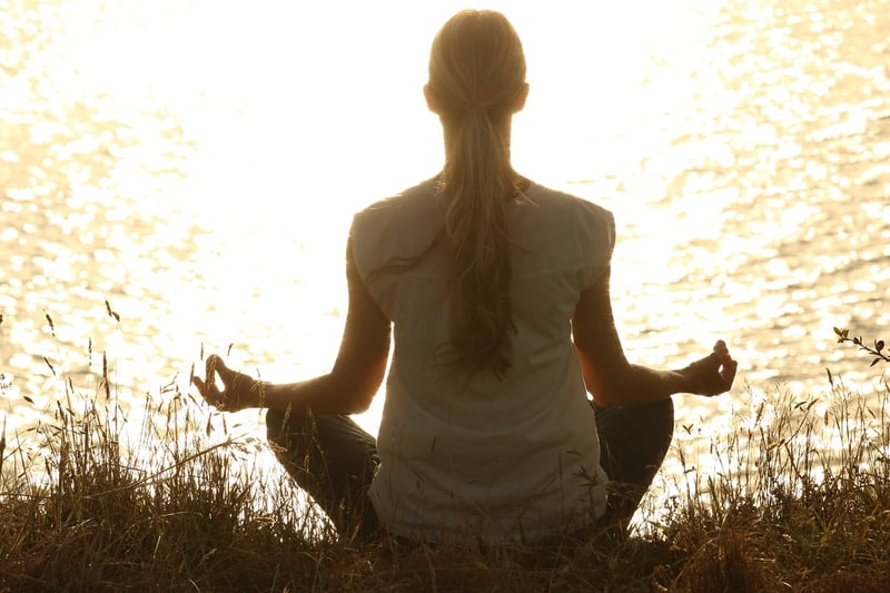 Woman practicing mindfulness through expressive movement